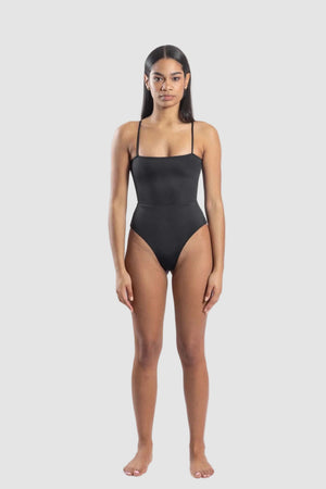 Women’s sustainable one-piece swimsuit with adjustable straps in black - front view