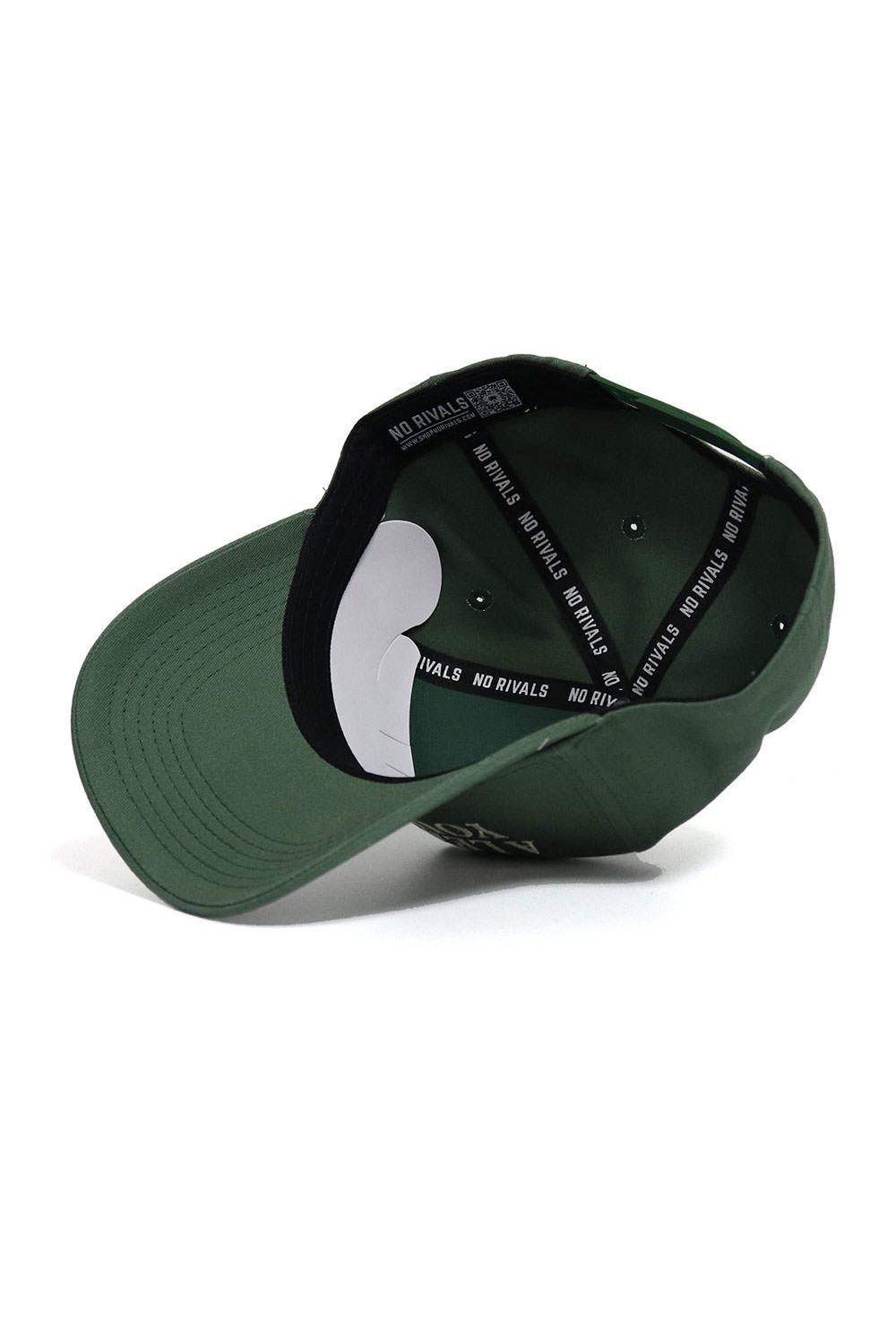 The ALOYO Hat from the No Rivals Collection by No Rivals is shown upside down, displaying a black inner band with “NO RIVALS” in white and a snap back closure for a comfortable, one-size-fits-all fit.