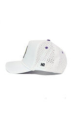 Side view of the No Rivals ECU Gameday Hat, a white snapback baseball cap with perforated ventilation holes, a purple top button, and a small black-and-white NR logo patch on the side. Set against a plain white background.