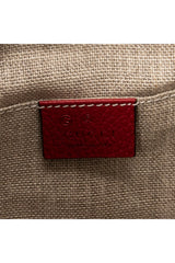 Bamboo Tassel Zip Clutch 