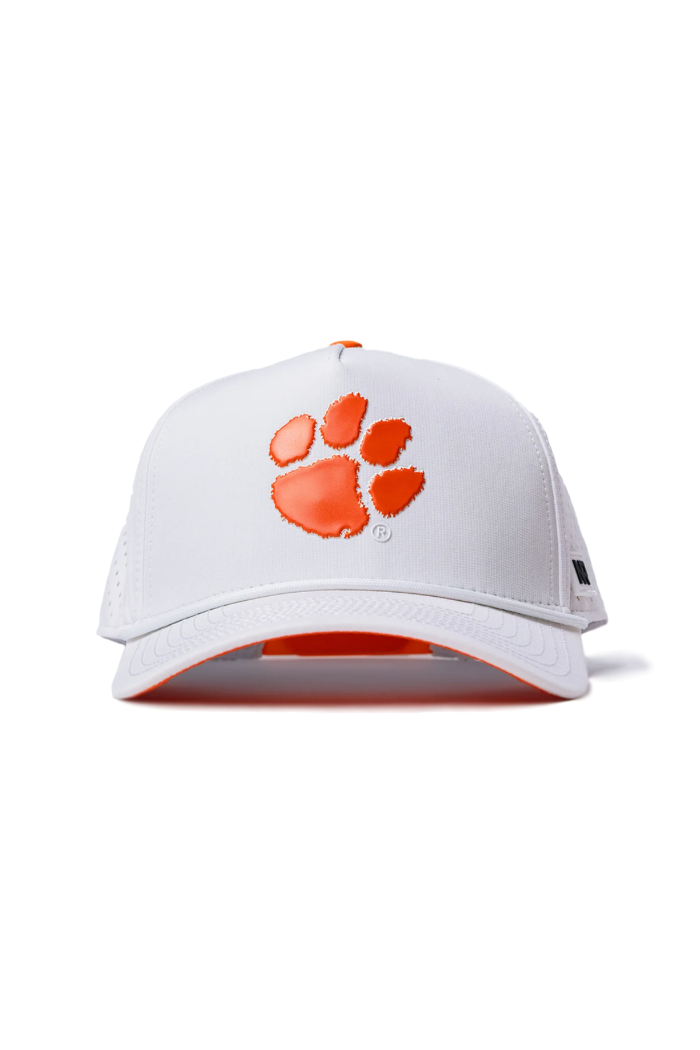 The No Rivals Clemson Gameday Hat is a white snapback featuring an embroidered orange paw print on the front, made from a polyester-cotton blend—ideal for your gameday look. Displayed from the front on a plain white background.