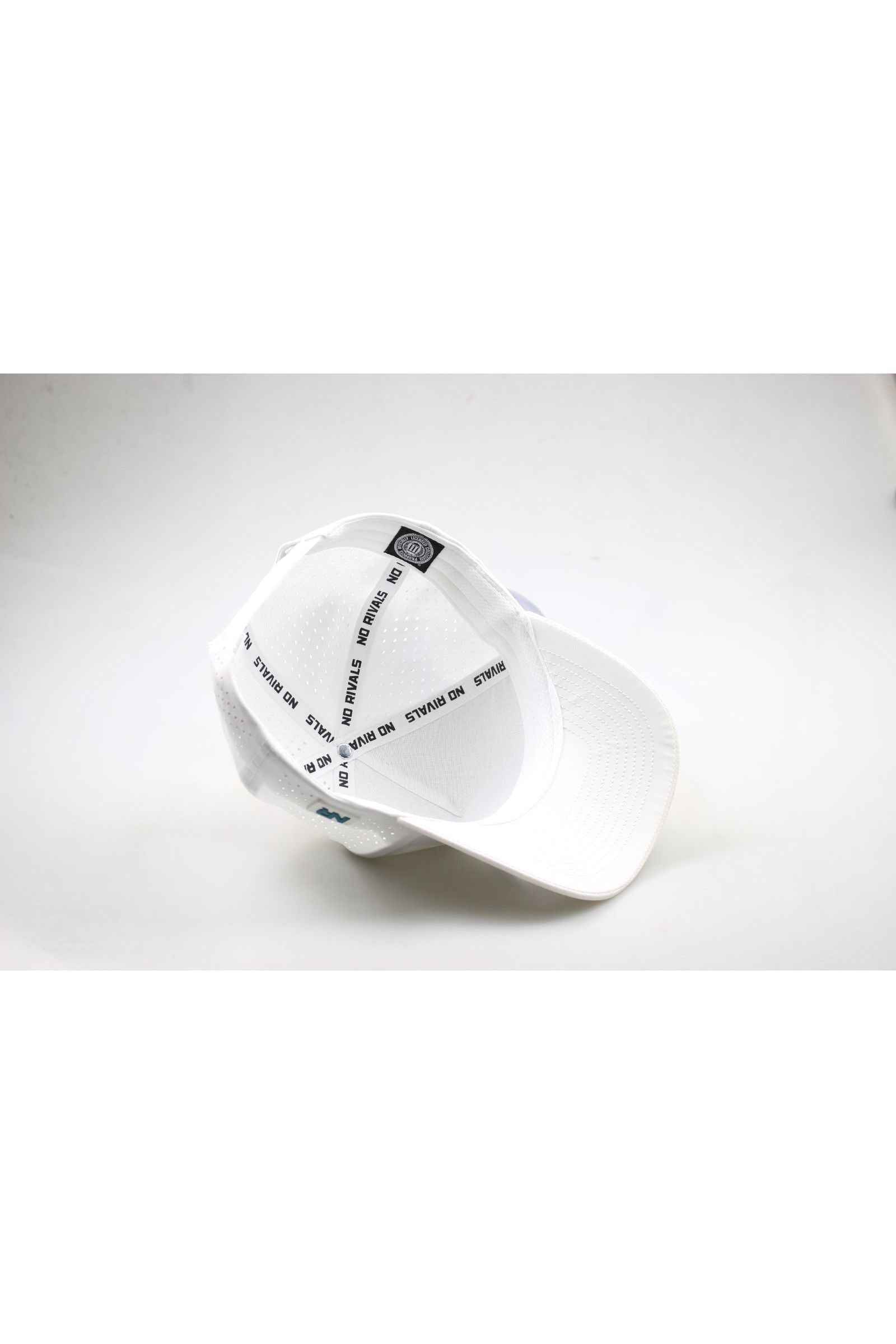 A white Costal Carolina University Gameday Hat, flipped upside down to reveal black "NO RIVALS" text along the inner seams, is shown on a plain white background. This is an officially licensed snapback baseball cap.