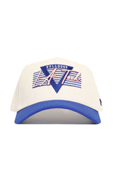 The No Rivals LA Tech Triangle Game Cap Hat is a white baseball cap with a blue brim, Bulldogs LA Tech logo in blue, red, and white, stripes and a bold V shape on the front, plus an easy snap back closure. Officially licensed design.