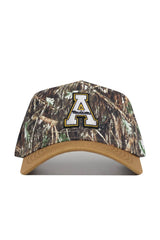 The App State Camo Hat - Explorer Edition is a premium cotton camouflage baseball cap with a tan brim, showcasing a bold embroidered letter A accented in black, white, and gold on the front.