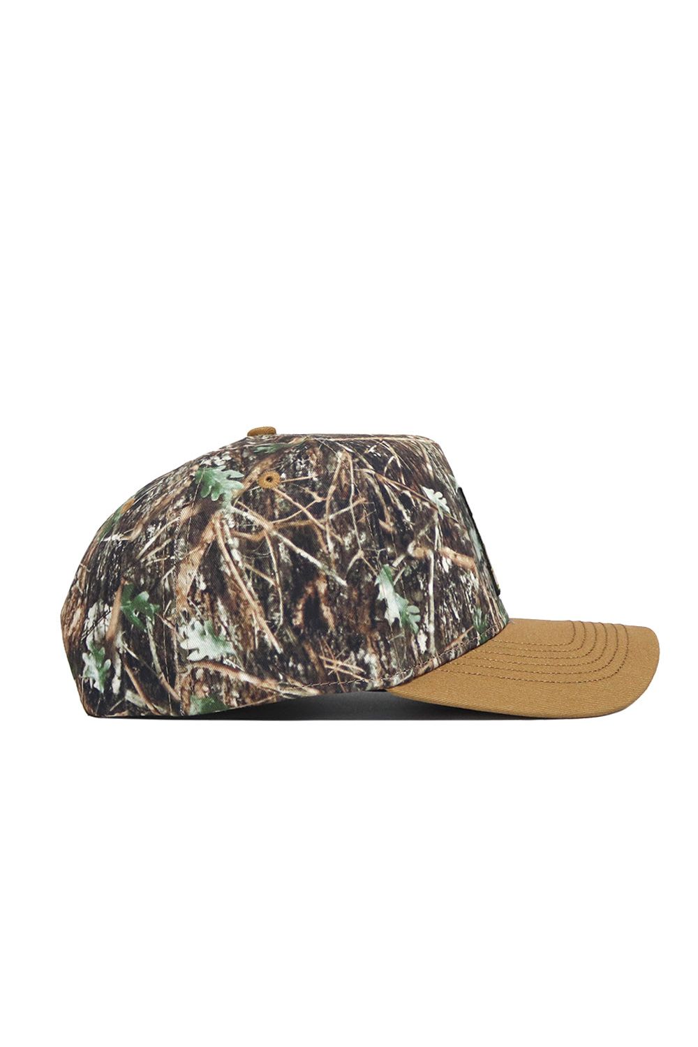 A side view of the App State Camo Hat - Explorer Edition, featuring a camouflage crown and solid brown brim made from high quality cotton, shown against a white background.