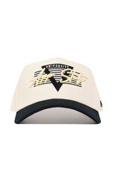 The No Rivals App State Triangle Game Cap Hat is beige with a black brim, black and white stripes, a black triangle, and yellow and white "UNIVERSITY" and "Air Sto" embroidery on the structured front for lasting shape.