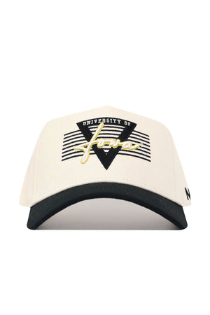 The Iowa Triangle Game Cap Hat by No Rivals is a white cotton snapback cap with a black brim, triangle and stripes design, and "University of Iowa" embroidered in white and gold on the front for a structured fit.