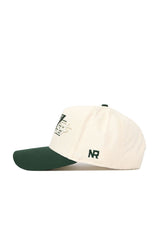 The No Rivals Colorado State Triangle Game Cap Hat features a cream color with a dark green brim and top button, green NR side embroidery, an abstract green and white front design, and a structured fit for lasting shape.