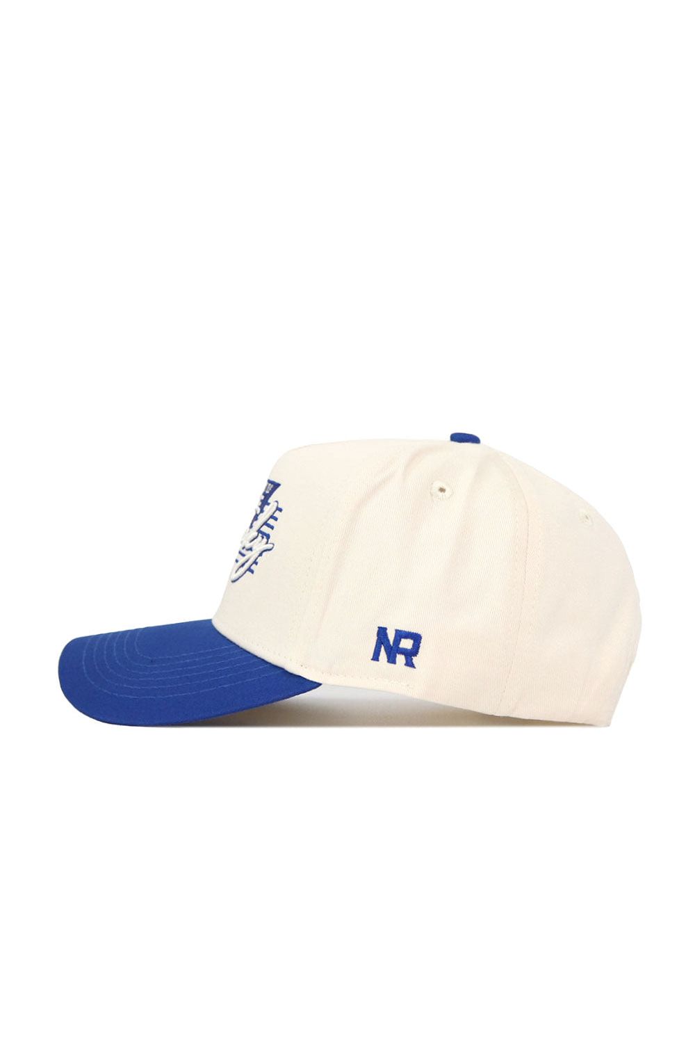The No Rivals Kentucky Triangle Game Cap Hat is a white cap with a blue brim, top button, and NR embroidery on the side, offering a structured fit to maintain its shape.