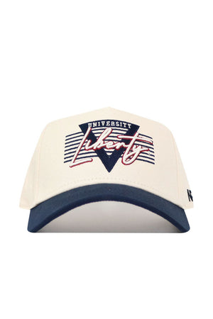 The No Rivals Liberty Triangle Game Cap Hat is a cream snapback with a navy brim, "University Liberty" text, and a red and blue striped triangle design on the front. Officially licensed and structured for comfort.