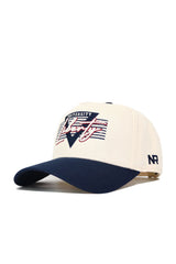 The Liberty Triangle Game Cap Hat by No Rivals features a cream, structured fit with a navy brim. "Liberty University" is embroidered on the front and "NR" on the side. This officially licensed snapback delivers style and authenticity.