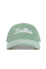 The No Rivals Dallas Corduroy Hat in Spring Green is an unstructured 6-panel cap with "Dallas" embroidered in white cursive and an adjustable strap for a perfect fit.