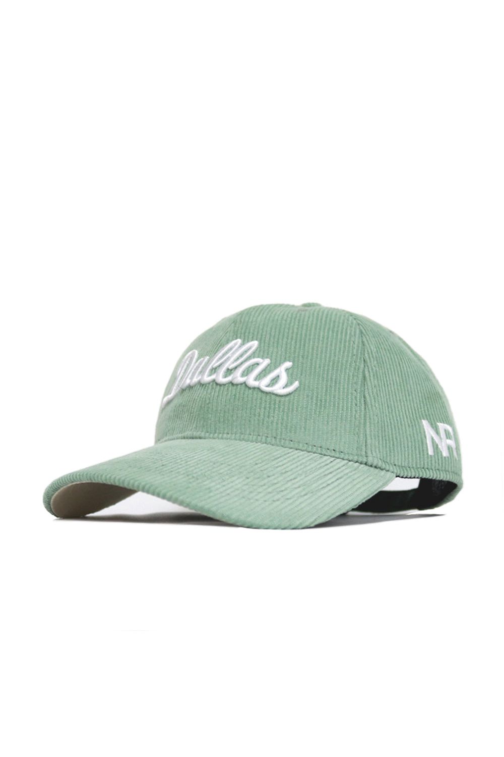 The No Rivals Dallas Corduroy Hat in Spring Green features an unstructured 6-panel design, a curved brim, adjustable back strap, "Dallas" embroidered on the front, and "NR" stitched on the side.