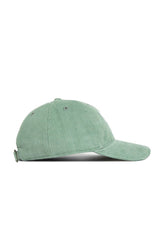 The No Rivals Kentucky Corduroy Hat – Unstructured in Spring Green (B2B) features a 6-panel design, curved brim, and adjustable back strap, shown here in a light green side profile view.