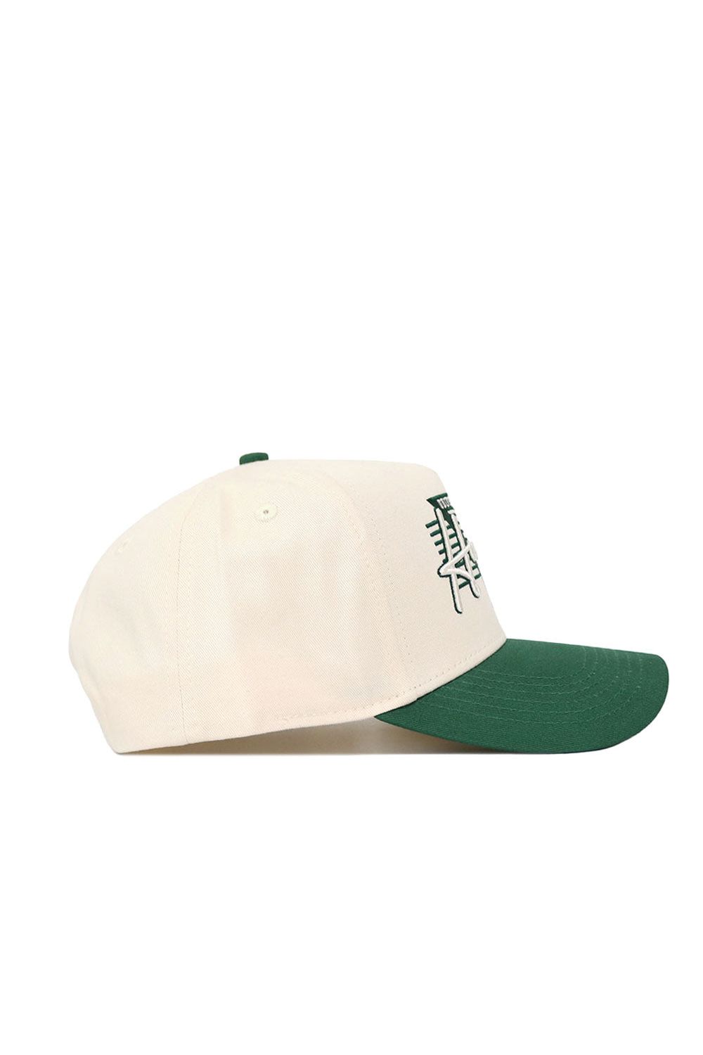 The No Rivals Hawai'i Triangle Game Cap Hat is a cream snapback with a green bill, seen from the side. It features structured front panels with stylized green design, all set against a plain white background.
