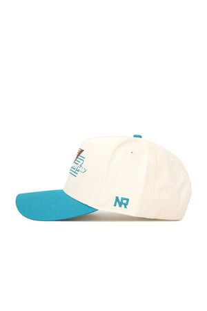 The No Rivals Coastal Carolina Triangle Game Cap Hat is a white snapback with a teal brim and top button, NR embroidered in teal on the side, and a touch of multicolored graphic on the front, offering structured comfort and style.