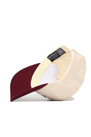 The Texas A&M Triangle Game Cap Hat by No Rivals is shown upside down, highlighting its inner lining, label, and structured curved brim.