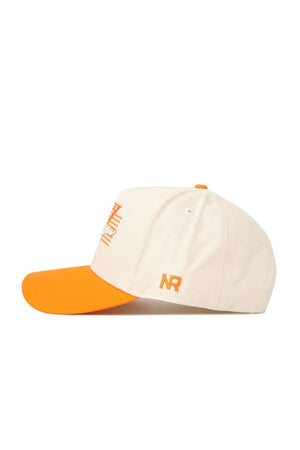 The No Rivals Tennessee Triangle Game Cap Hat features a cream color, orange brim, and orange NR embroidery on the side plus a front design. Shown in profile, this structured snapback offers lasting shape.