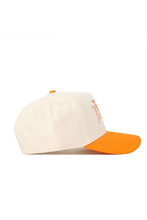 The No Rivals Tennessee Triangle Game Cap Hat features a cream snapback design with an orange brim and orange embroidered front text, shown from the side.