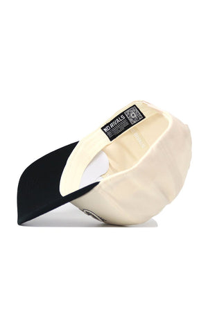 The Colorado Triangle Game Cap Hat is shown upside-down, revealing a cream-colored snapback with a black brim. The inside label displays "NO RIVALS," a QR code, and branding. This officially licensed cap features a structured fit.