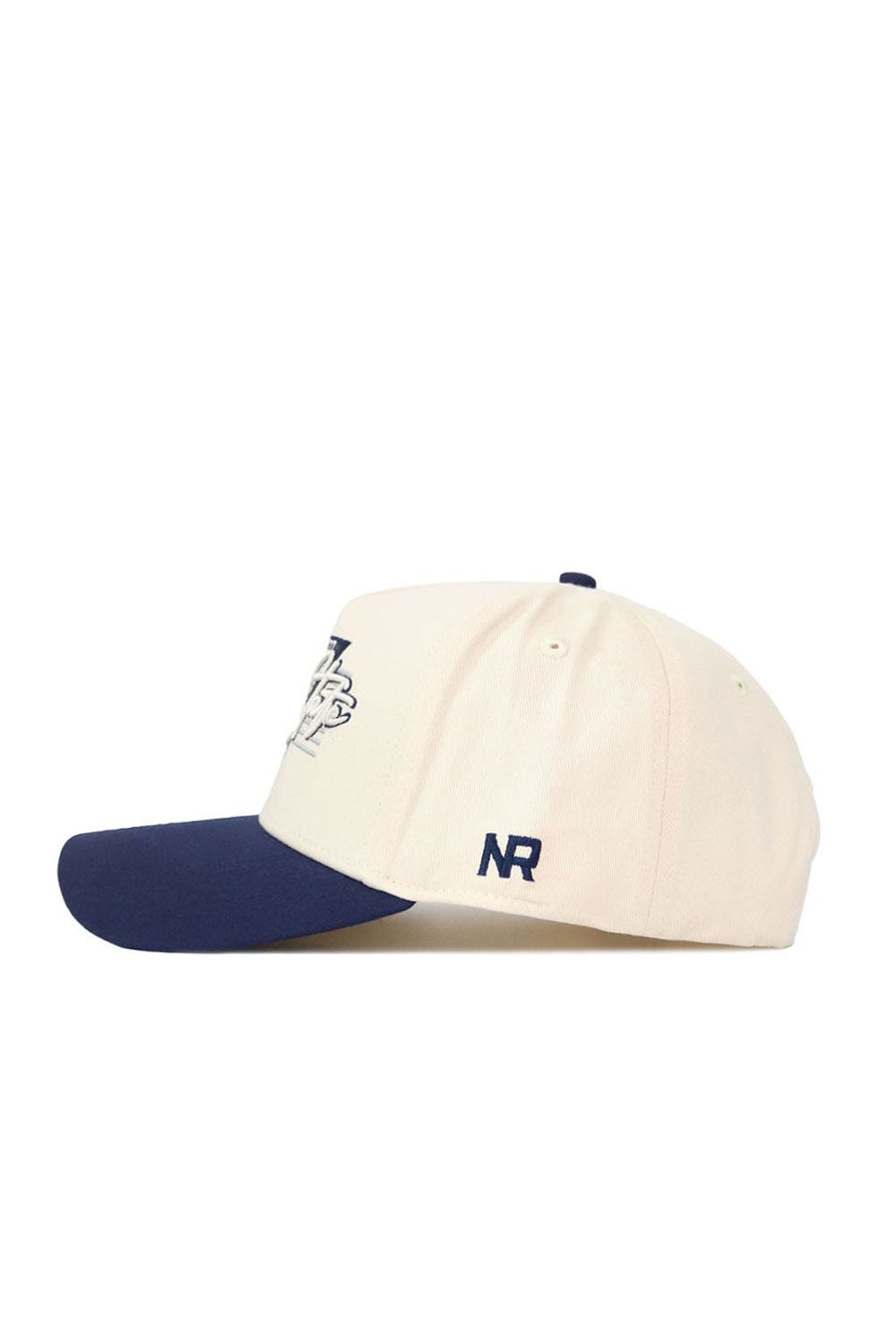 The No Rivals Penn State Triangle Game Cap Hat is cream with a navy brim, structured fit, and navy embroidered NR on the side. It features a snapback closure, top button, and is shown in left-side profile against a white background.