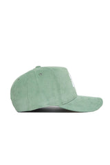 The No Rivals Texas A&M Corduroy Hat in Spring Green features a structured fit, flat brim, and visible stitching on the crown and brim. Shown from the side, this snapback hat offers a fresh look in light green corduroy.