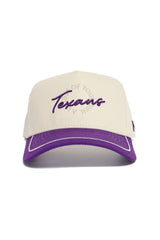 The Tarleton State Texans ALOYO Hat by No Rivals features a cream structured fit, purple brim, "Texans" embroidered in purple with arched text above, crafted from premium cotton, and finished with an adjustable snapback closure.