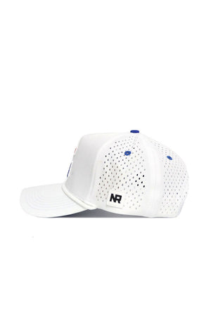 The LA Tech Gameday Hat is a white snapback with perforated back panels, a blue top button, and a black NR logo tag by the adjustable strap. Shown in side profile—just right for your next gameday look.