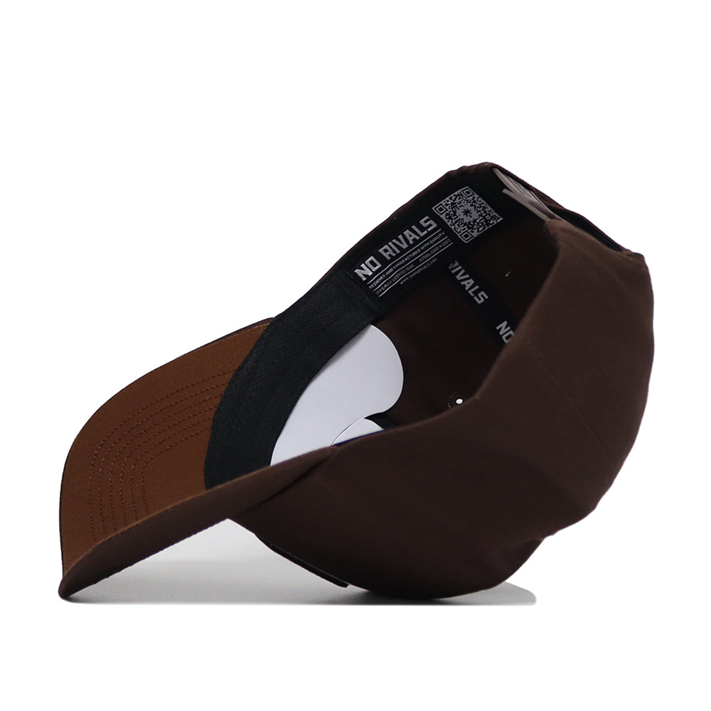The Miami Hurricanes Americano Hat is shown upside down, revealing its black sweatband and "NO RIVALS" inner band. This structured snapback cap features a brown color and is made from high-quality cotton for comfort and durability.