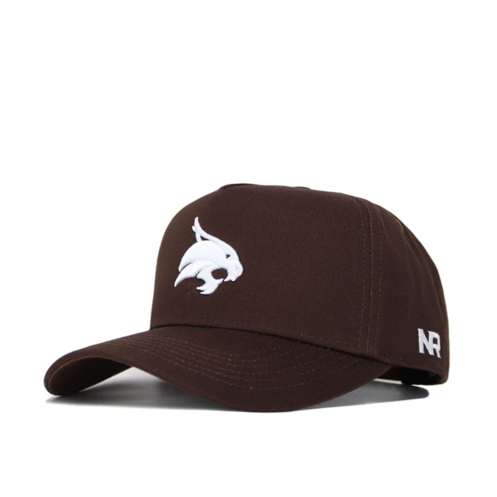 The Texas State Americano Hat is a brown structured baseball cap with a white embroidered bobcat head logo on the front, NR lettering on the side, and an adjustable snapback closure.