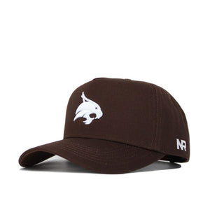 The Texas State Americano Hat is a brown structured baseball cap with a white embroidered bobcat head logo on the front, NR lettering on the side, and an adjustable snapback closure.
