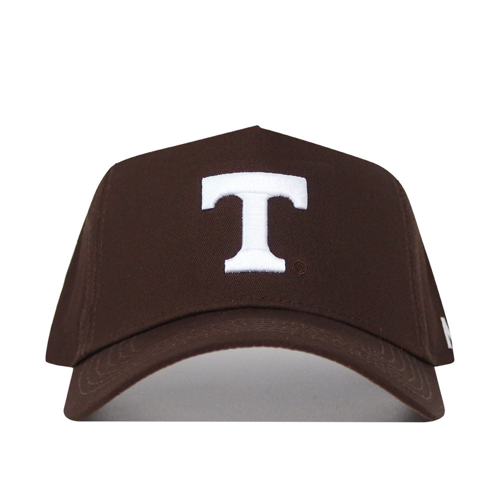 The Tennessee Americano Hat is a brown baseball cap with a large white letter T on the front, made of high quality cotton and designed with a structured fit for lasting comfort.
