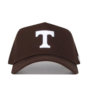 The Tennessee Americano Hat is a brown baseball cap with a large white letter T on the front, made of high quality cotton and designed with a structured fit for lasting comfort.