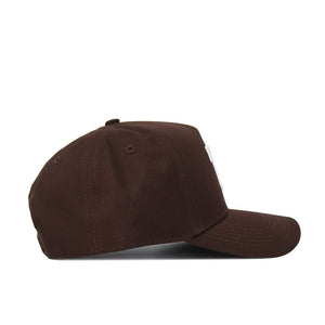 The Tennessee Americano Hat is a structured, plain dark brown baseball cap with a curved brim and crown, shown from the side against a white background.