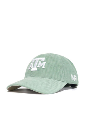 The Texas A&M Corduroy Hat by No Rivals features spring green corduroy, a white embroidered ATM logo on the front, NR on the side, curved brim, unstructured fit, and adjustable strap for comfort. Officially licensed.