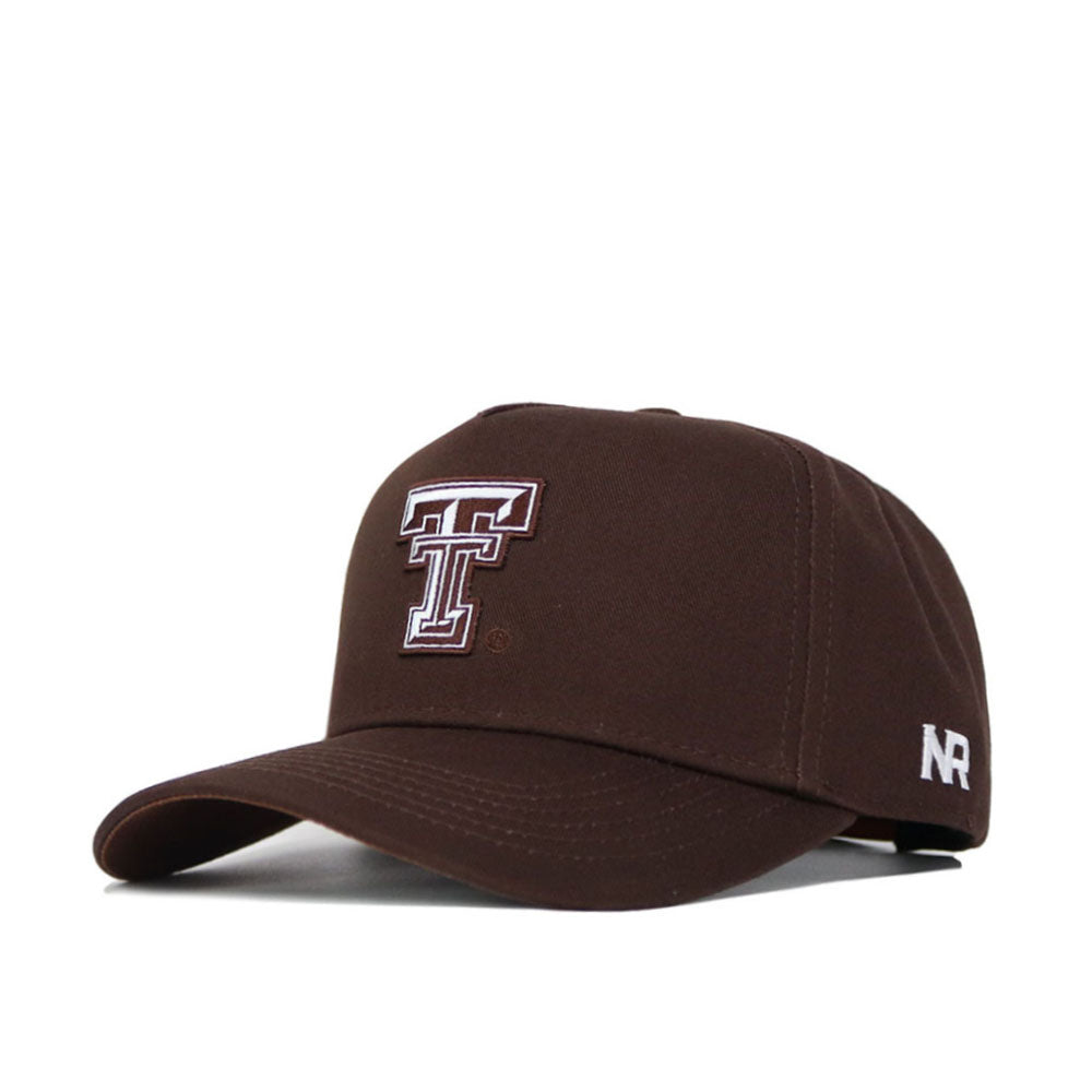 The Texas Tech Americano Hat is a brown cotton baseball cap with a white outlined “TT” logo on the front, a small white NR logo on the left, and features a curved brim and classic design.