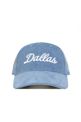 The No Rivals Dallas Corduroy Hat - Unstructured in Sky Blue (B2B) features white "Dallas" cursive embroidery on the front, a 6-panel unstructured design, and an adjustable strap, shown against a white background.