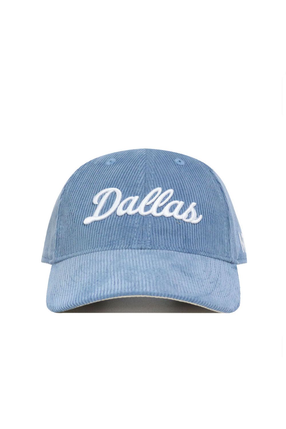 The No Rivals Dallas Corduroy Hat - Unstructured in Sky Blue (B2B) features white "Dallas" cursive embroidery on the front, a 6-panel unstructured design, and an adjustable strap, shown against a white background.