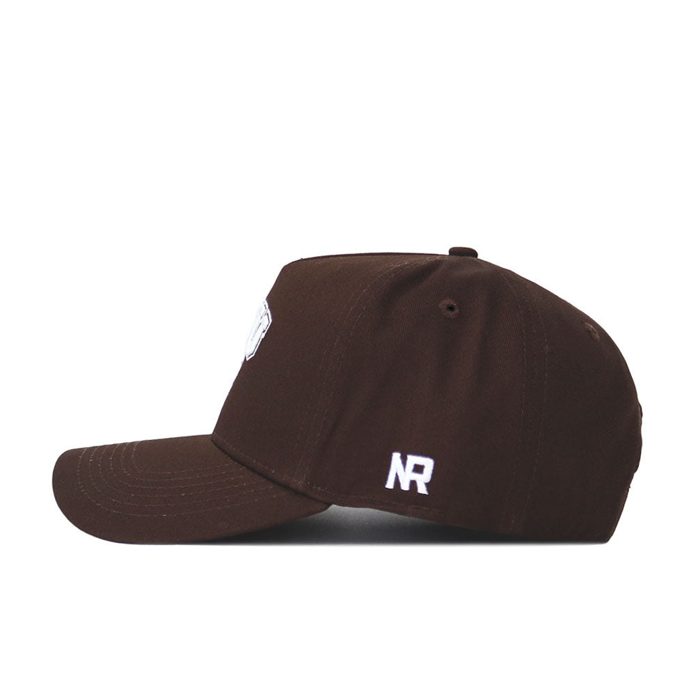 The Western Carolina Americano Hat is a brown high-quality cotton baseball cap, shown from the side with white NR embroidery near the back, a slightly curved brim, visible stitching, and a structured fit.