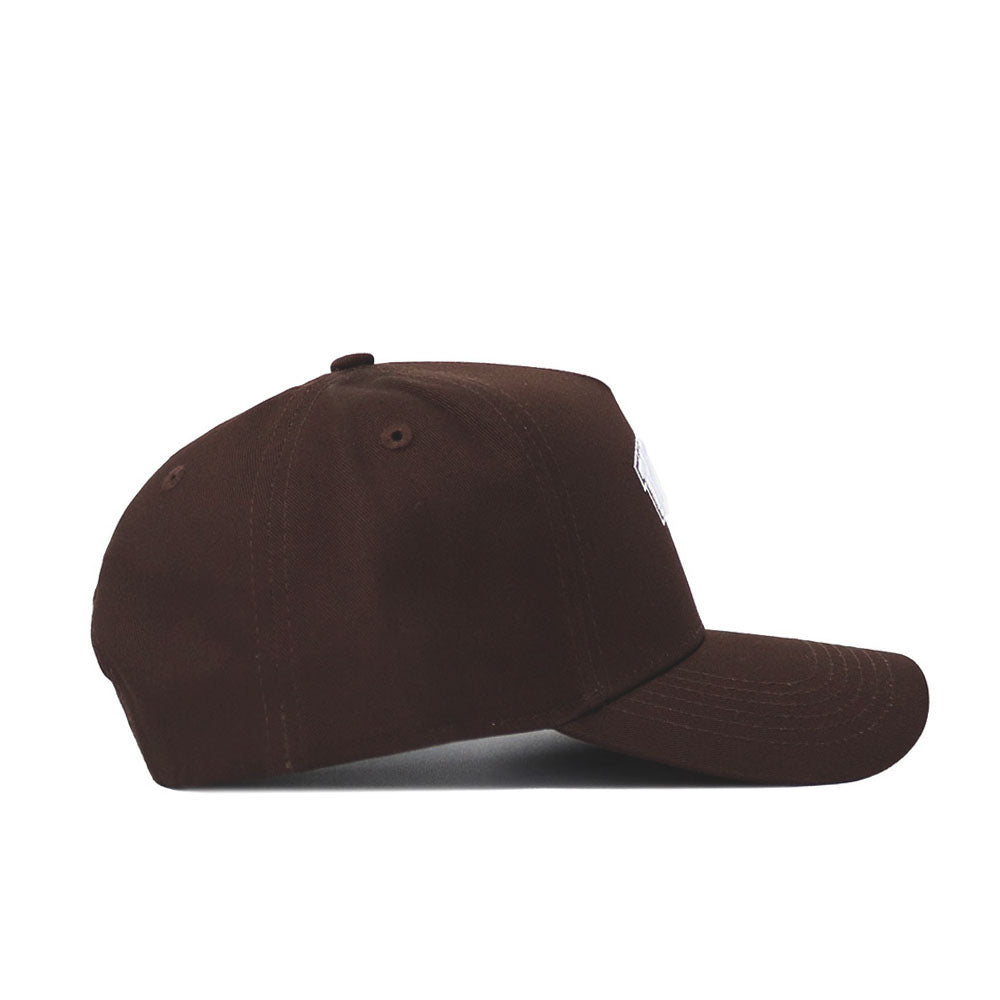 The Western Carolina Americano Hat is displayed from the side, showcasing its structured fit, dark brown color, curved brim, and visible stitching on a white background.
