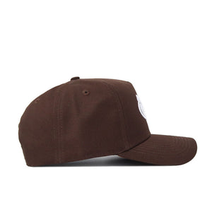 The Florida Atlantic (FAU) Americano Hat is a brown structured fit cap with visible stitching, a slightly curved brim, and a small white embroidered logo on the front panel. Made from high quality cotton for everyday comfort.