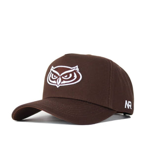 The Florida Atlantic (FAU) Americano Hat is a brown structured cotton cap with a white embroidered owl face on the front and “AR” lettering on the left side.