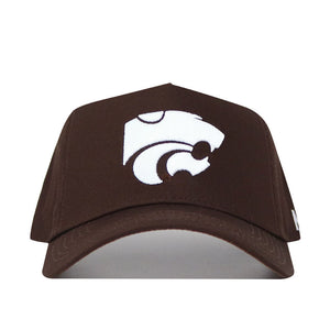The Kansas State Americano Hat is a brown cotton baseball cap featuring a white stylized wildcat logo on the front.