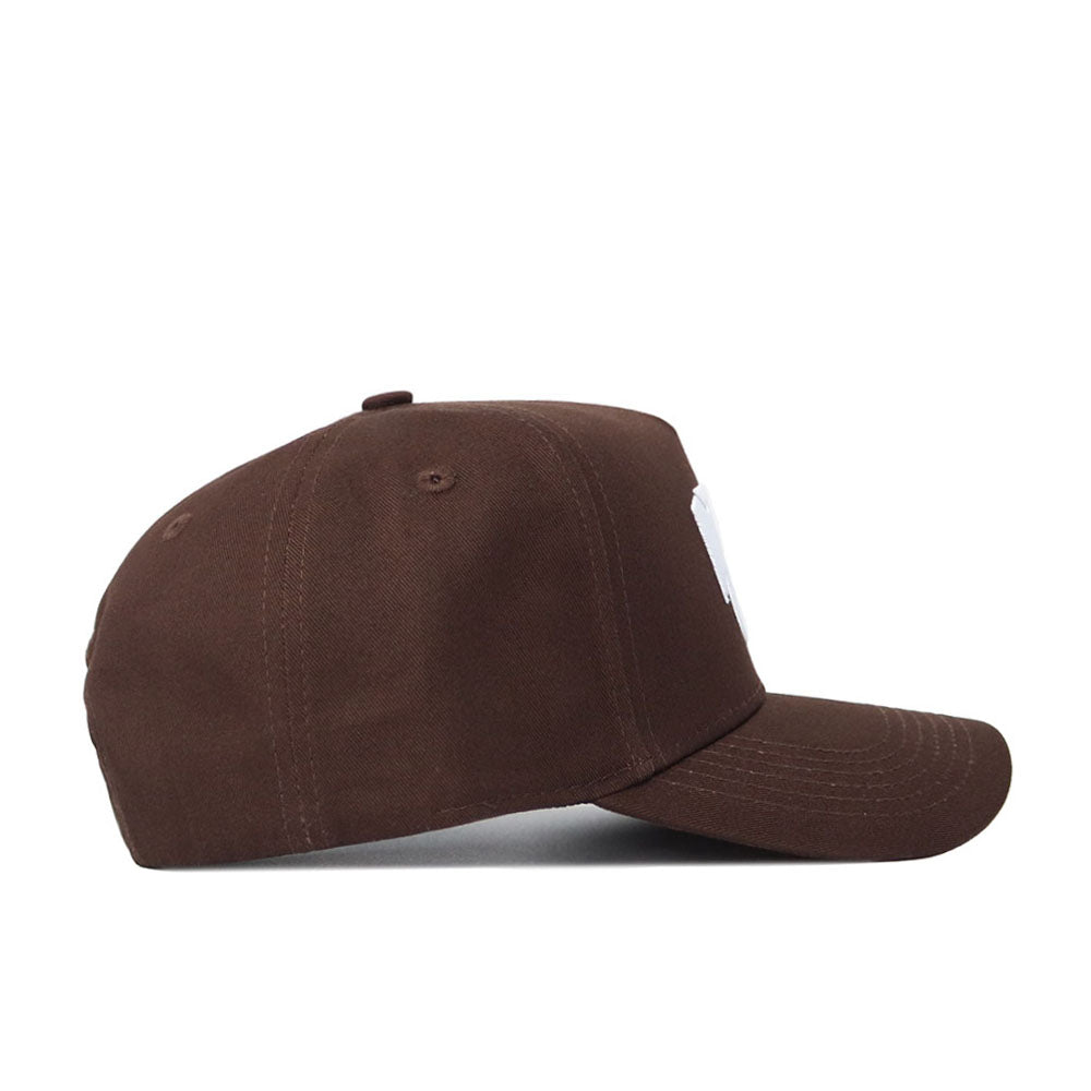 The Kansas State Americano Hat is a brown cotton baseball cap with white stitching on the brim and crown, a curved brim, and a front panel featuring a partially visible emblem or logo.