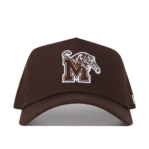 The Memphis Americano Hat is a brown snapback made from high-quality cotton, featuring a large white "M" outlined in brown with a detailed white tiger head on the front panel for a structured fit.
