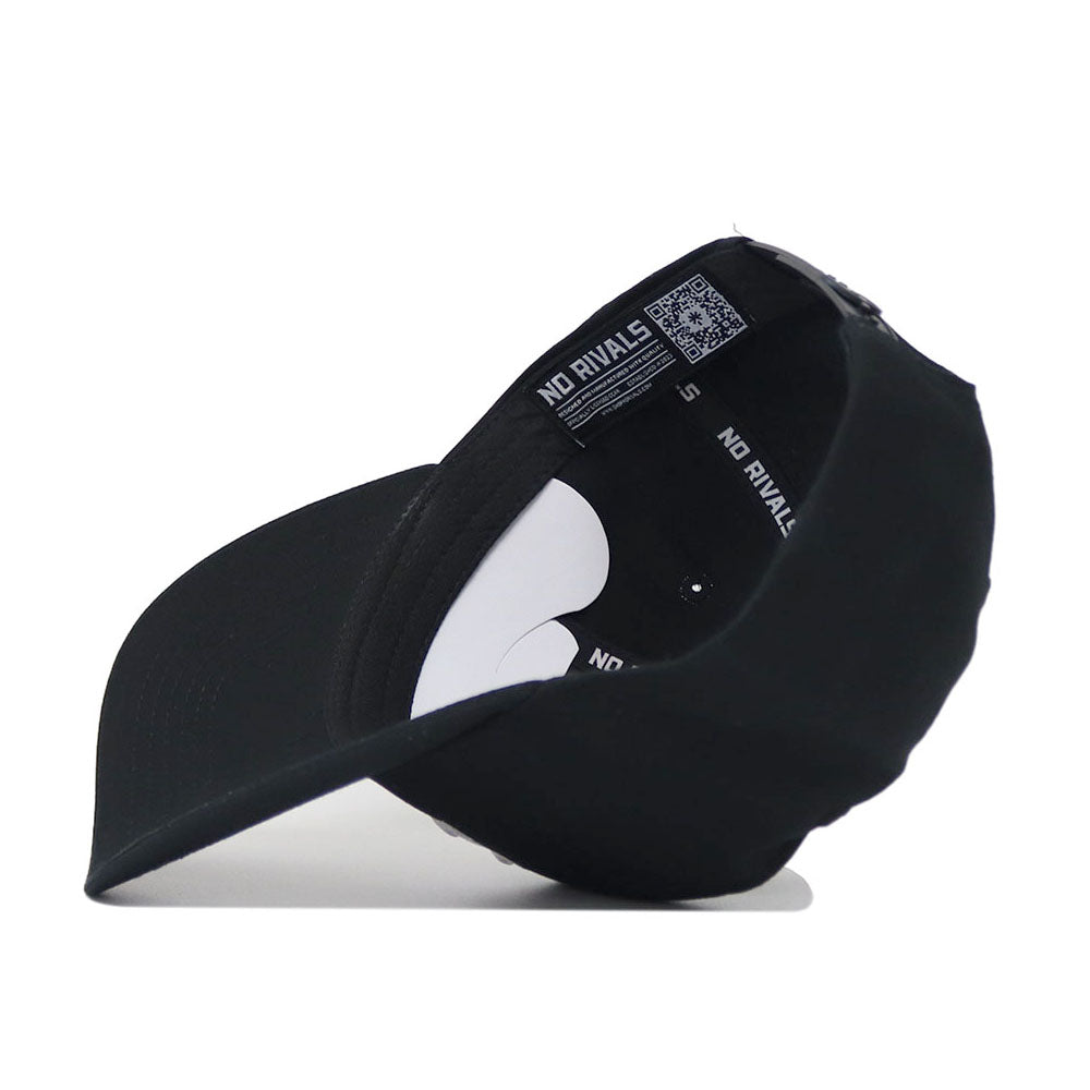 A bottom view of the Purdue Americano Hat, a black snapback, shows the inside band labeled "NO RIVALS" in white and a QR code on the high-quality cotton fabric near the adjustable strap.