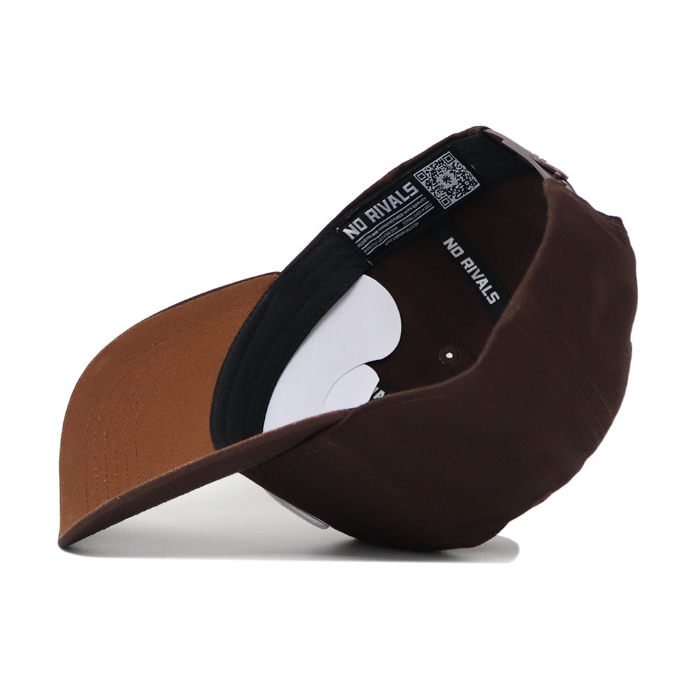 The Georgia Americano Hat, a brown snapback made from high quality cotton, is pictured upside down to show its adjustable strap and inner band repeatedly printed with the words NO RIVALS.