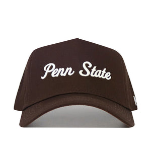 The Penn State Americano Hat is a brown cotton baseball cap featuring "Penn State" embroidered in white script on the front for comfort and durability.