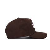 The LSU Americano Hat, a dark brown baseball cap with a structured fit, is shown from the side on a white background. It features cotton fabric, a curved brim, and raised white embroidery on the front panel.
