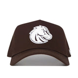 The Boise State Americano Hat is a brown baseball cap with a white embroidered horse head logo, made from high-quality cotton. It features a structured fit and a snapback closure for convenience.